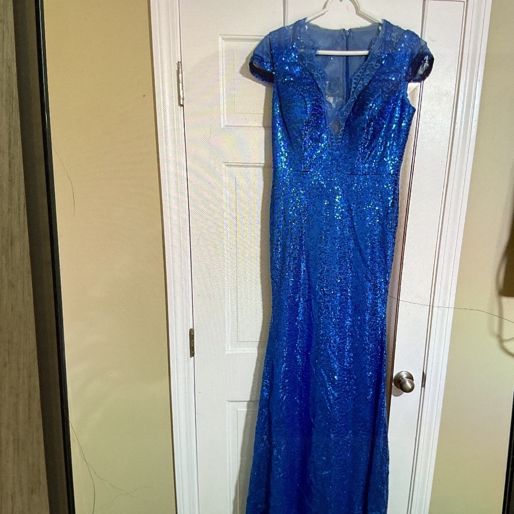 Gown new never worn missacc size 10 ocean blue